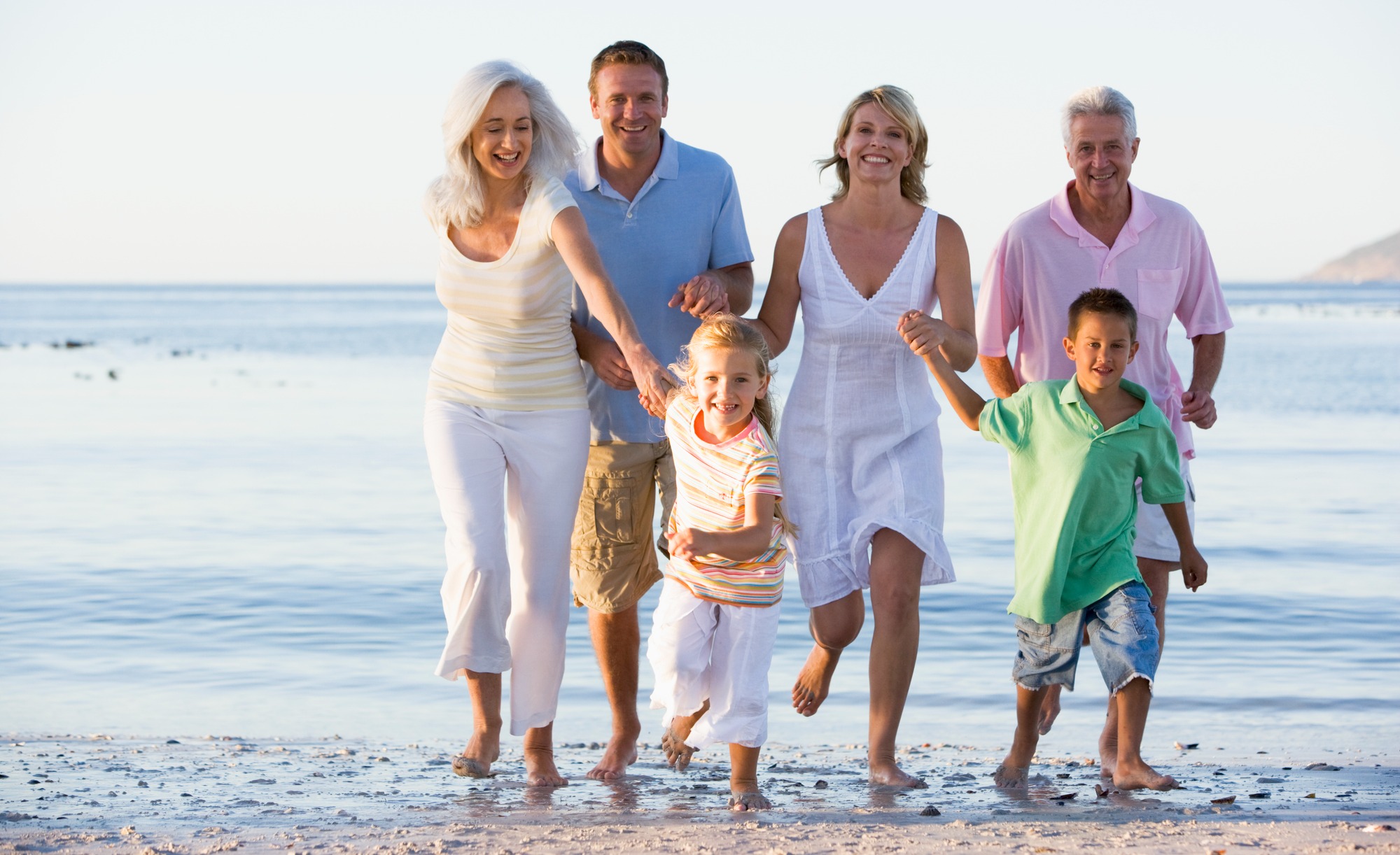 Multi-generational Family Walking on Beach